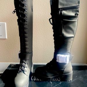 Knee high leather boots These foods have never been worn still in the box size 7